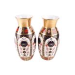 A pair of large boxed Royal Crown Derby "Old Imari" pattern ovoid vases both bearing date marks