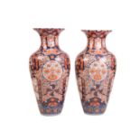 A pair of very large Japanese Imari porcelain baluster floor vases, late Meiji Period late19th/