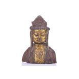 A Sino-Tibetan bronze bust of Tara, late 19th century, heavily cast with gilt decoration to the face