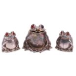 An unusual Comyns of London Ltd set of three cast silver toad form table cruets, late 20th