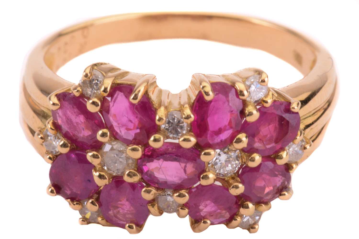 A ruby and diamond cluster ring, set with oval rubies and round brilliant cut diamonds, the shank - Image 2 of 6