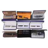 A collection of boxed and cased Waterman, Parker and Shaefer fountain pens, including a metallic