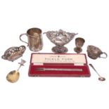 A small collection of silver items including, an Edwardian pierced silver pedestal bonbon stand,