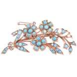 A turquoise floral brooch designed as a spray of flowers, set throughout with cabochon turquoise (