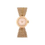 A Zenith Lady's dress watch in 9ct gold with a stylised woven bow style bracelet and clasp. Model: