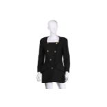 Chanel - a black collarless square-neck jacket, circa 1990s, with padded shoulders and two large