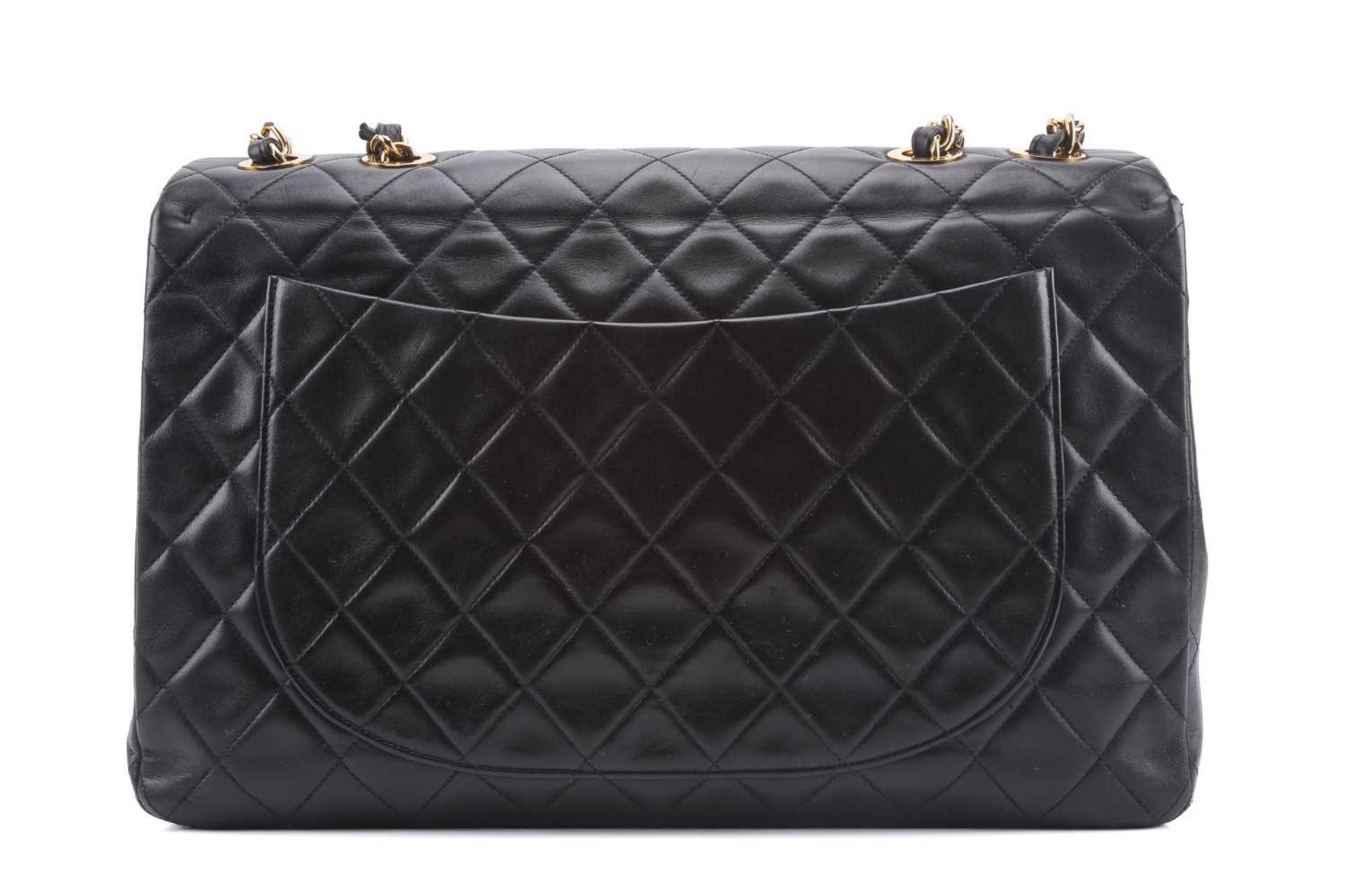 Chanel - a jumbo XL single flap bag in black diamond-quilted lambskin leather, circa 1991, - Image 4 of 15