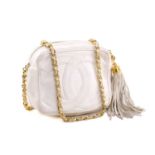 Chanel - a mini camera bag in white leather, circa 1986, interlocking 'CC' logo appliqué on the