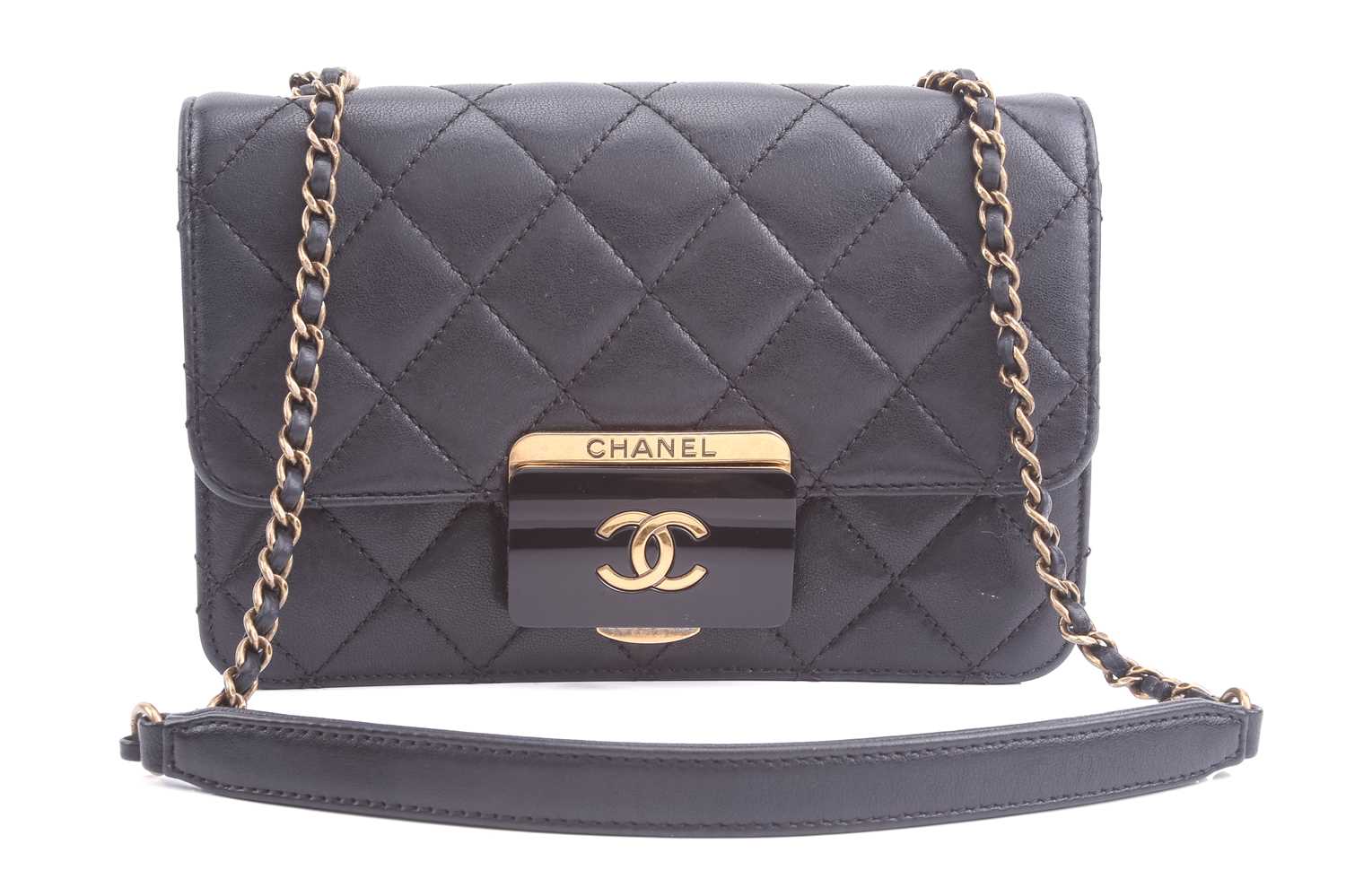 Chanel - a mini Beauty Lock flap bag in black quilted sheepskin leather, circa 2016, rectangular