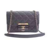 Chanel - a mini Beauty Lock flap bag in black quilted sheepskin leather, circa 2016, rectangular