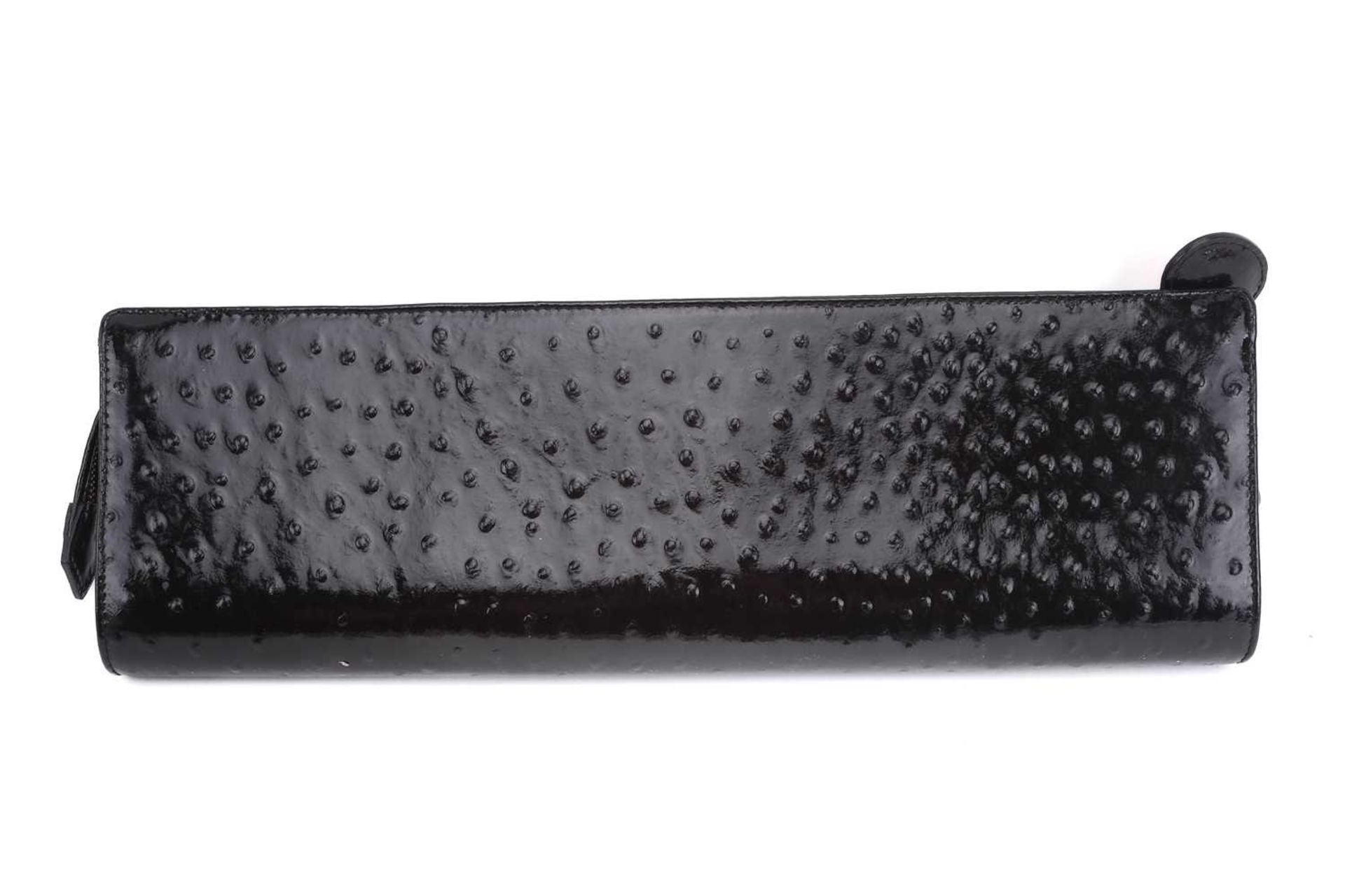 Vivienne Westwood - an extra long clutch in black patent mock ostrich leather, embellished with - Image 6 of 7