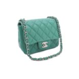 Chanel - a mini flap bag in green diamond-quilted lambskin leather, circa 2016, square body with