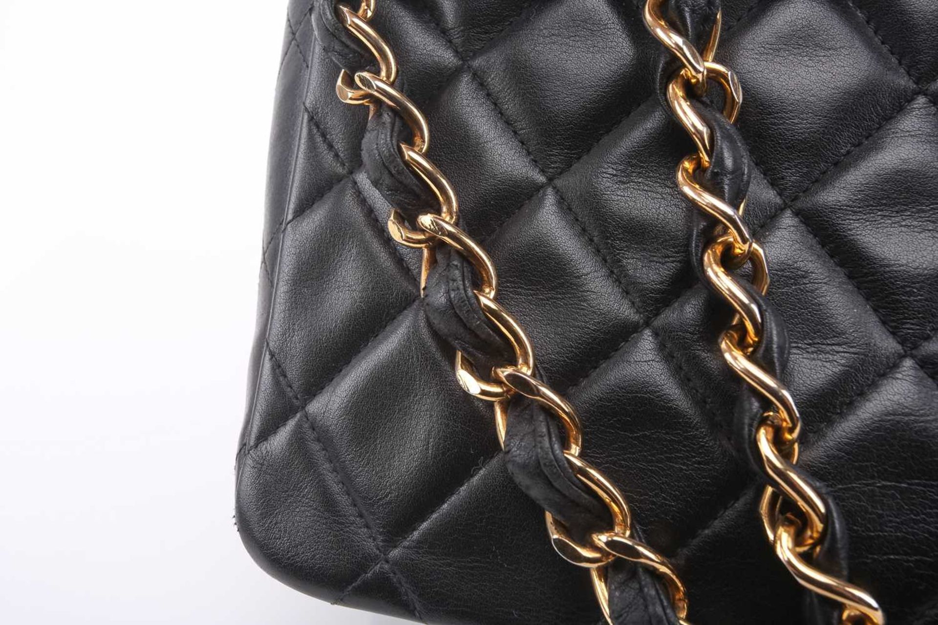 Chanel - a jumbo XL single flap bag in black diamond-quilted lambskin leather, circa 1991, - Image 12 of 15