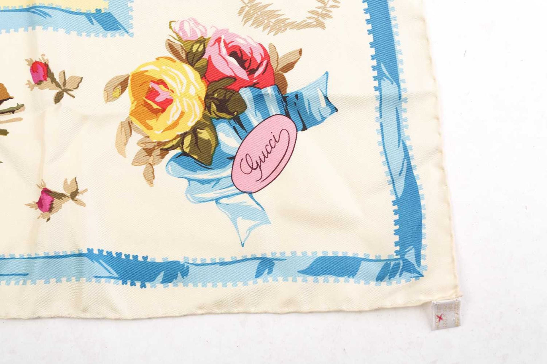 Gucci - a floral silk square scarf in pale yellow, embellished with roses and a light blue border, - Image 3 of 5