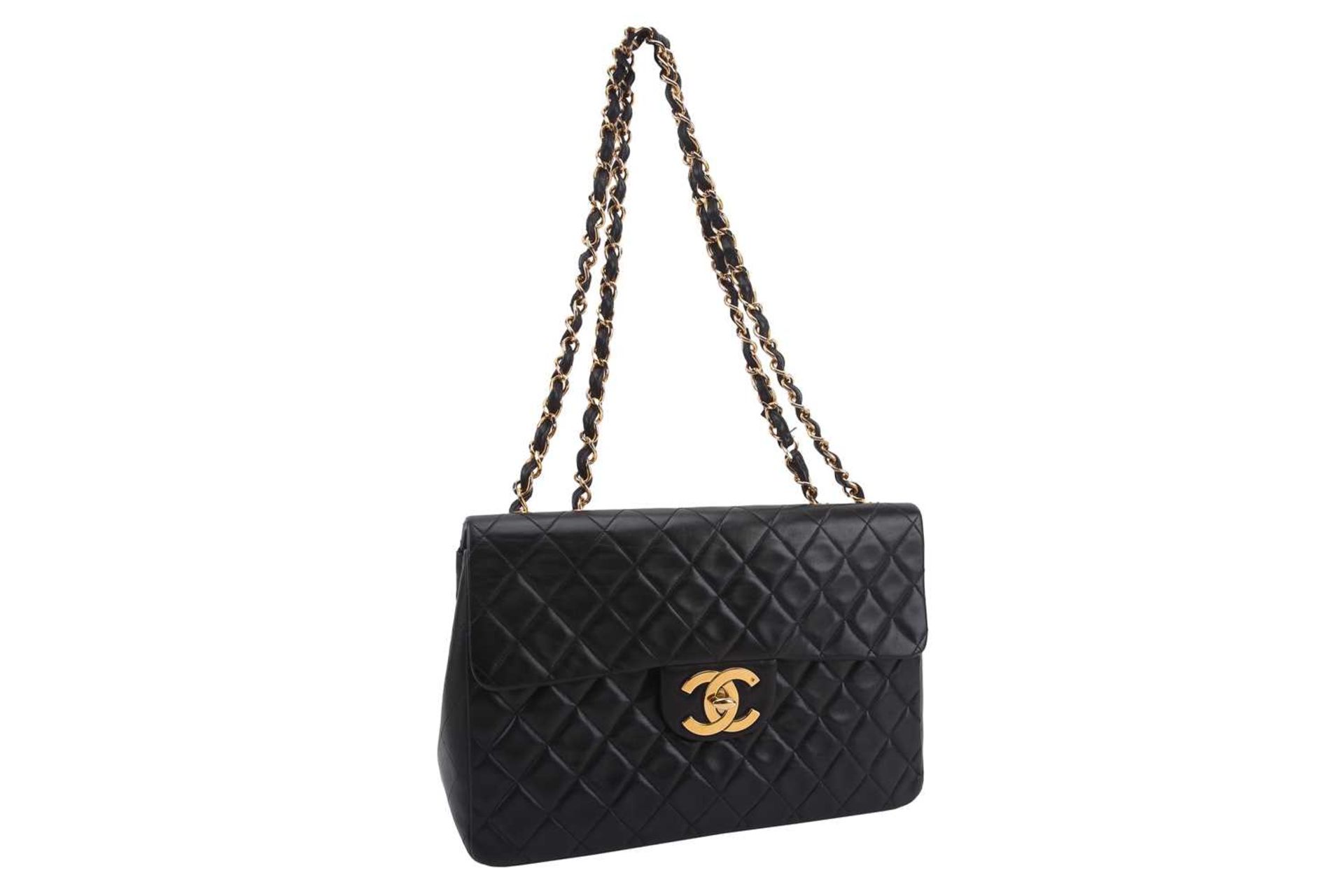 Chanel - a jumbo XL single flap bag in black diamond-quilted lambskin leather, circa 1991, - Image 5 of 15