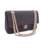 Chanel - a classic double flap bag in charcoal grey jersey fabric, circa 2002, rectangular body with