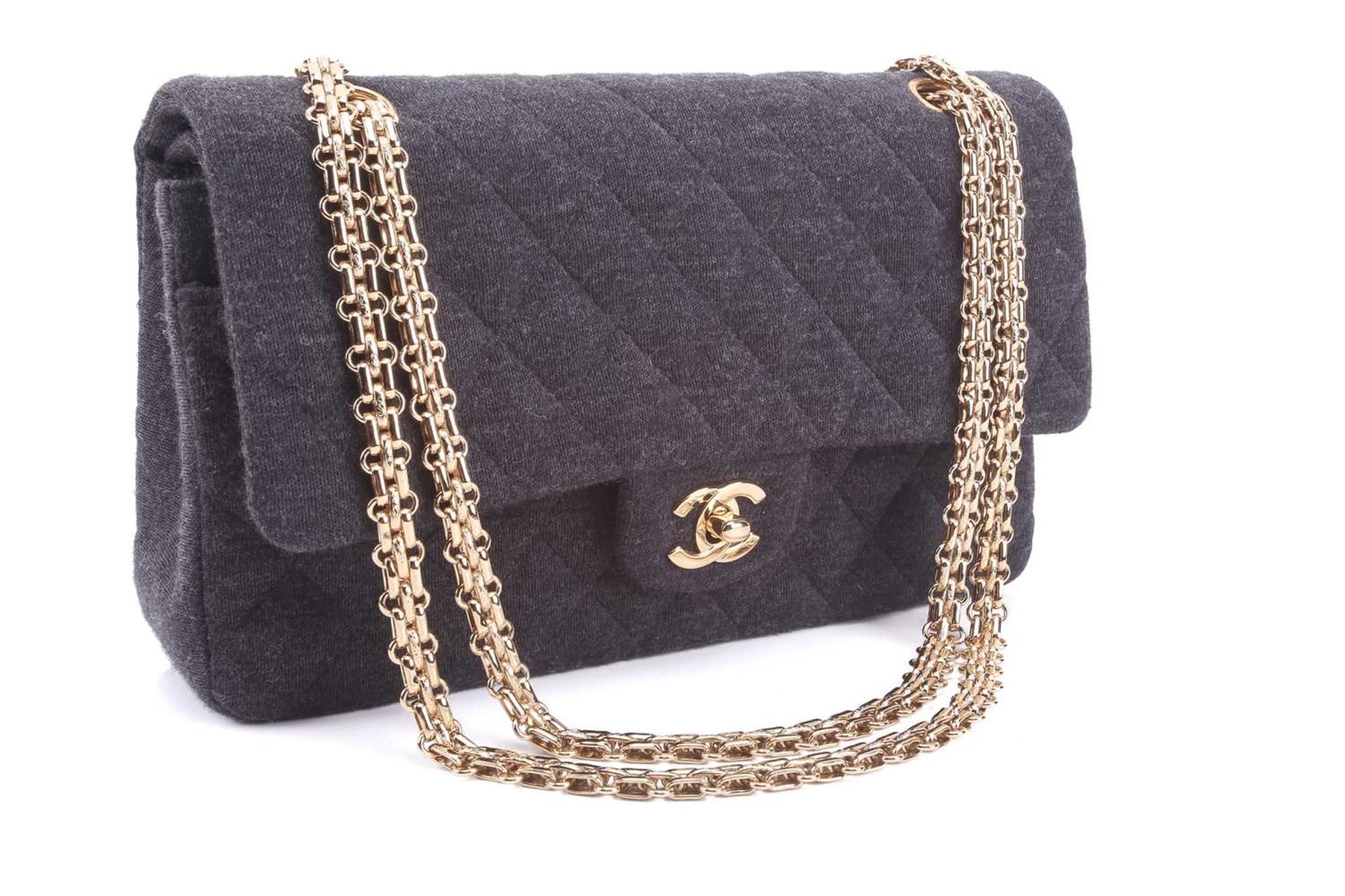 Chanel - a classic double flap bag in charcoal grey jersey fabric, circa 2002, rectangular body with