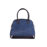 An Escada bowler bag in denim with black patent leather trims and base, embossed with EE logo at the