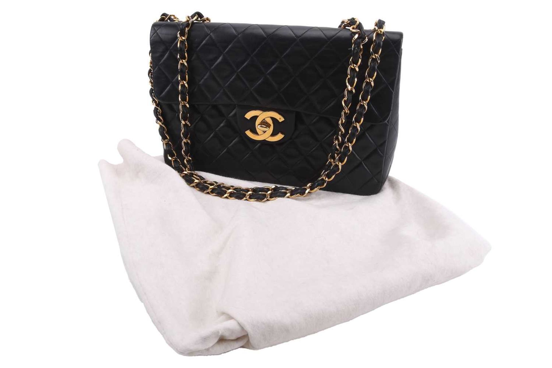 Chanel - a jumbo XL single flap bag in black diamond-quilted lambskin leather, circa 1991, - Image 14 of 15