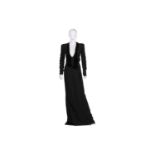 Giorgio Armani - a black full-length evening gown with velvet loose bow tie design around a deep V