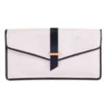 Yves Saint Laurent - an envelope clutch in white coated canvas and navy leather trims, circa 1980,