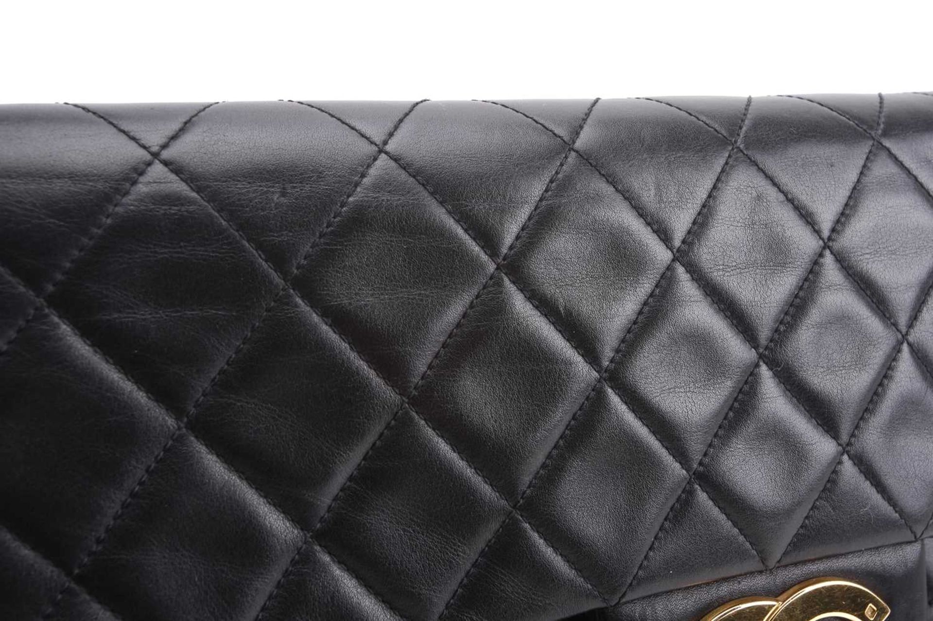 Chanel - a jumbo XL single flap bag in black diamond-quilted lambskin leather, circa 1991, - Image 9 of 15