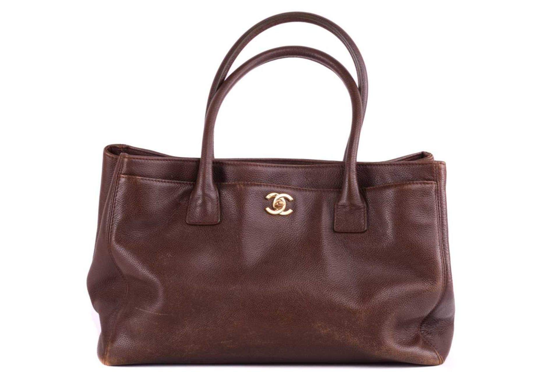 Chanel - an Executive tote bag in hazelnut brown grained leather, circa 1989, constructed with