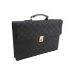 Gucci - a large briefcase in black jacquard nylon with black leather trims, flap fastens with a