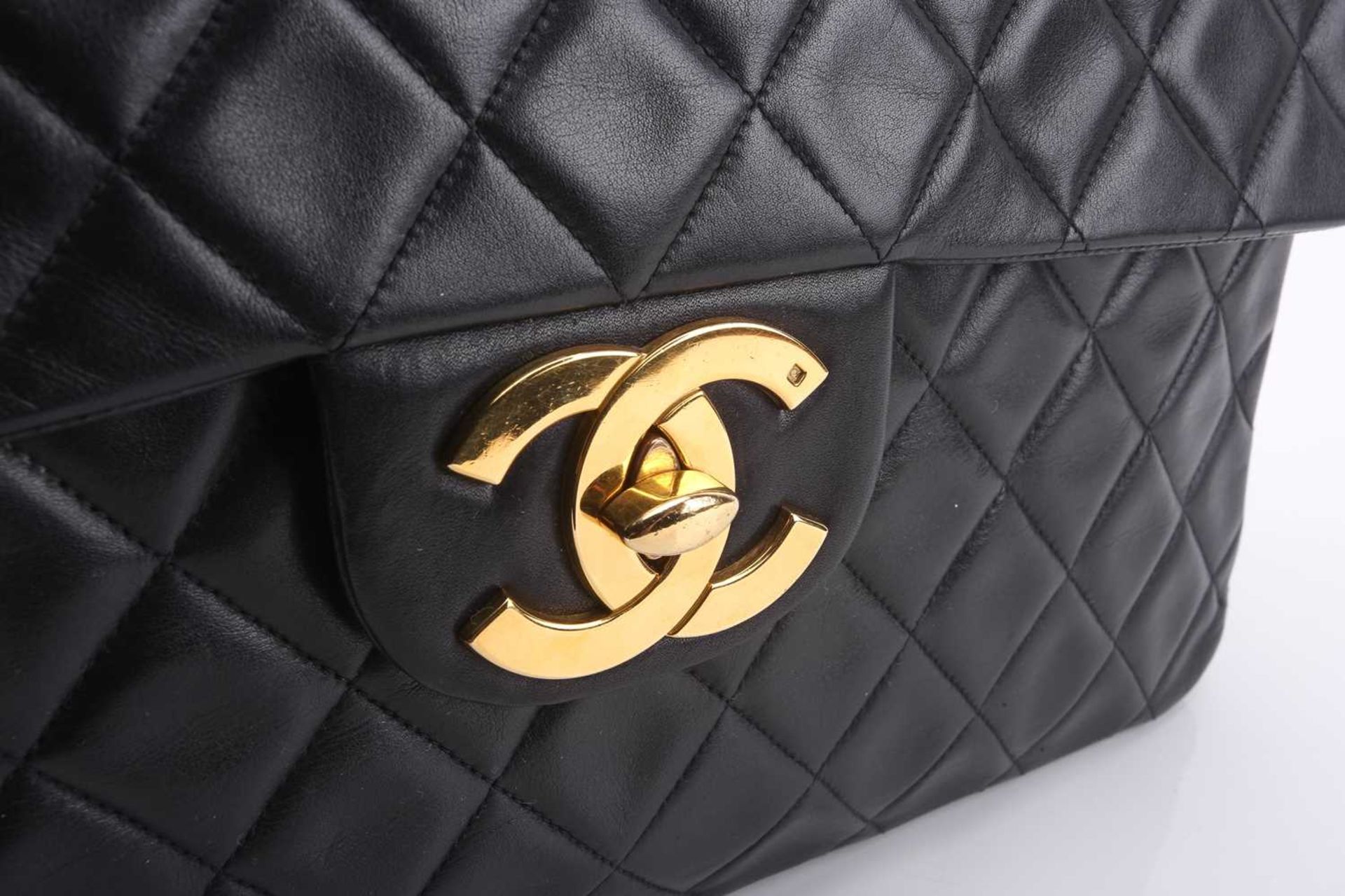 Chanel - a jumbo XL single flap bag in black diamond-quilted lambskin leather, circa 1991, - Image 8 of 15