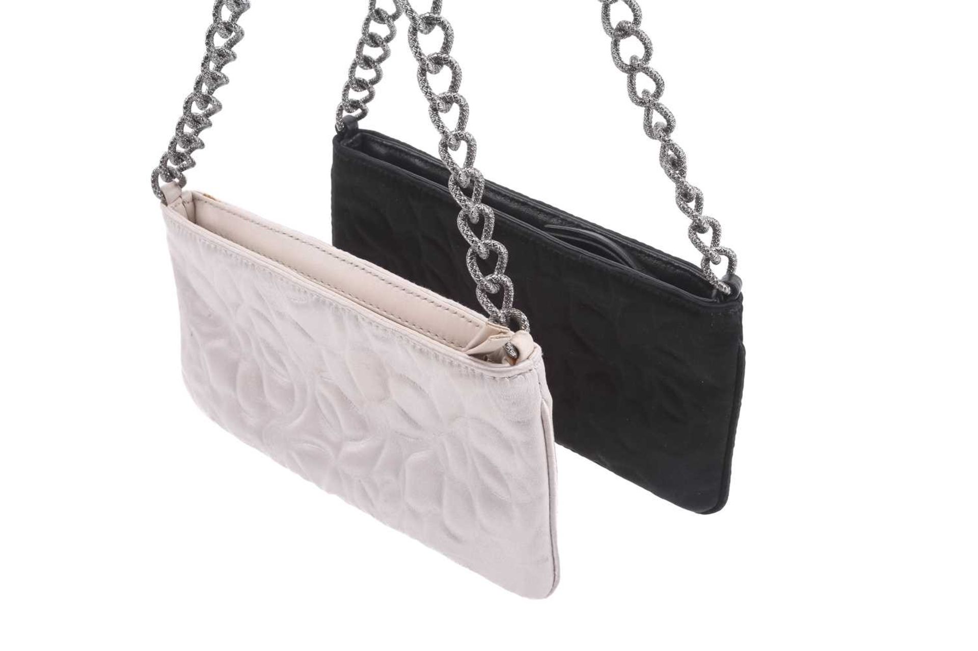 Chanel - two satin Camélia Pochettes; designed by Karl Lagerfeld, both black and white evening - Image 2 of 15