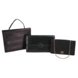 Two Gucci bags and a Giorgio Armani handbag; the Gucci black monogram canvas wallet on chain has a