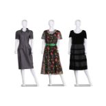 Two Donald Campbell dresses and a Bruce Oldfield collared sheath dress; the first is a printed