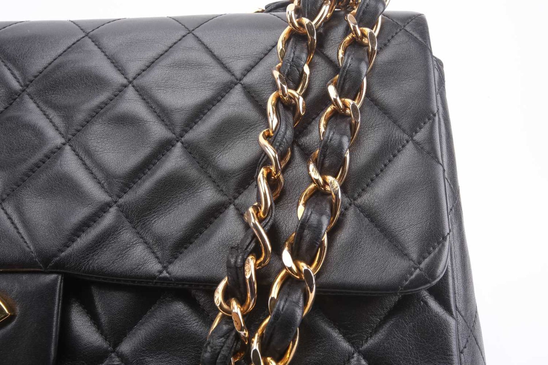 Chanel - a jumbo XL single flap bag in black diamond-quilted lambskin leather, circa 1991, - Image 13 of 15