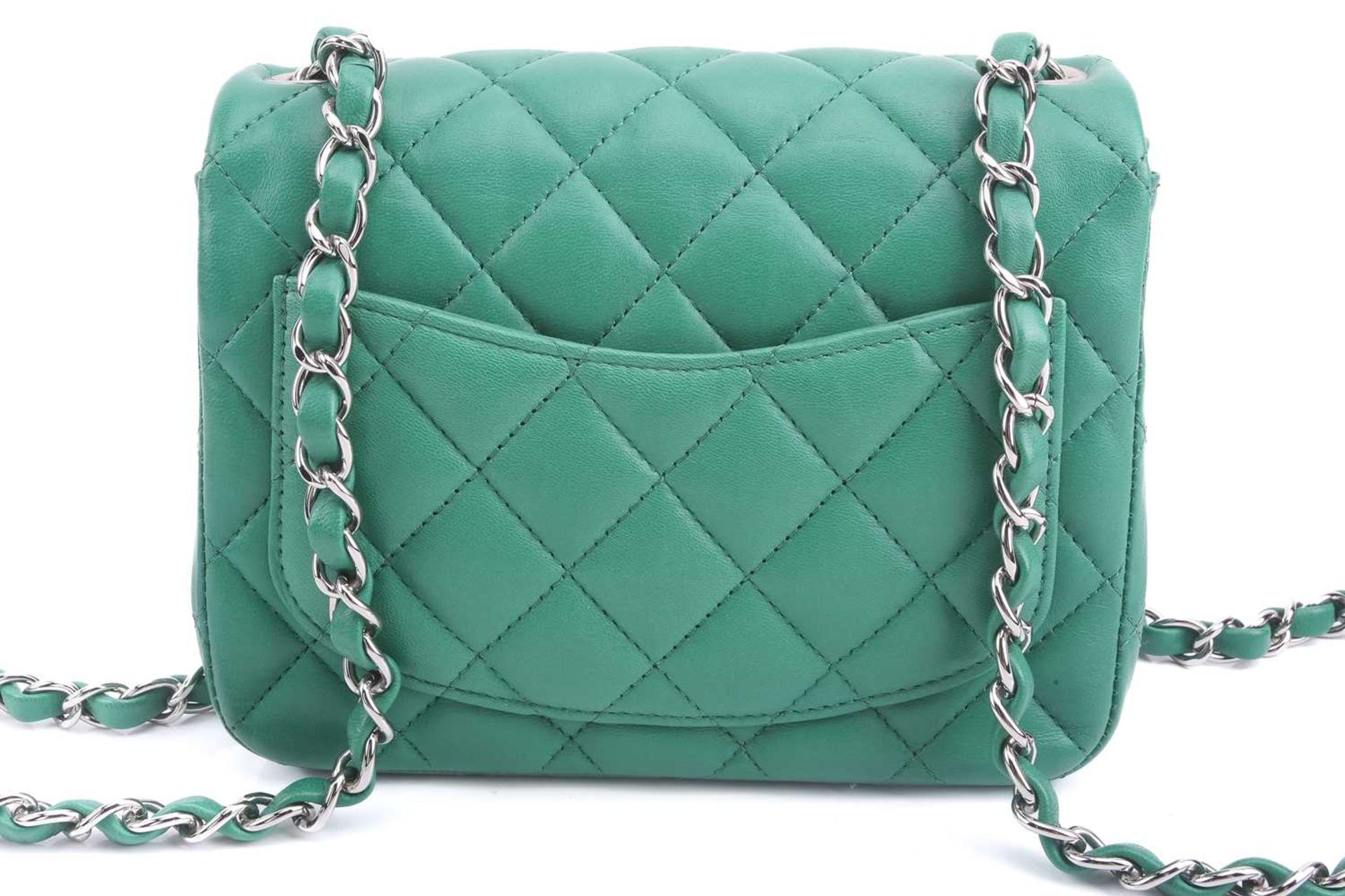 Chanel - a mini flap bag in green diamond-quilted lambskin leather, circa 2016, square body with - Image 10 of 12