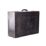 An Asprey black crocodile leather dressing case, the top embossed with a Baronial crown and C.C.