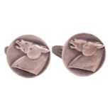 Georg Jensen - a pair of cufflinks depicting a horse head on circular disc panels, fitted with