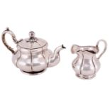 A 19th century Russian matched tea set of compressed melon form, comprising bachelors teapot and