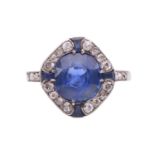 An Art Deco sapphire and diamond ring, circa 1920s, set with a central cushion shape sapphire