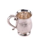 A Chinese silver tankard, 20th century, decorated with bamboo on a textured ground, scroll handle,