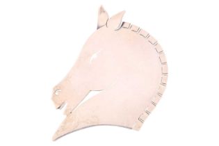 Georg Jensen - An equine brooch formed of a stylised horsehead silhouette, mirror finish, fitted