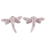 A pair of diamond dragonfly earrings, each designed as a dragonfly set throughout with round