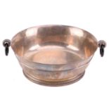 Cartier - an Art Deco fruit bowl with onyx handles, of circular form with flared and reeded rim,