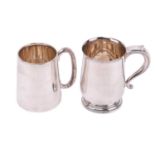 A heavy gauge silver tankard, Birmingham 1932 makers mark rubbed, with a slightly conical body and