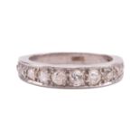 A diamond half-eternity ring, pavé-set with fifteen graduated old-cut diamonds, with an estimated