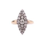 A diamond navette-shaped panel ring, set with a cluster of old-cut diamonds with an estimated