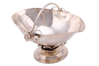 An early 20th century Georg Jenson 235B silver "Bud" basket, with the loop handle with two bud