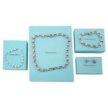 Tiffany & Co. - a collection of heart-themed jewellery; to include a heart padlock link necklace and