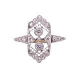 A Belle Epoque diamond dress ring, circa 1910, set with old cut diamonds in a lace openwork design