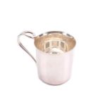 A boxed Tiffany silver christening mug (unengraved) with loop handle and plain flared body, in the