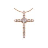 A diamond cross pendant, set with an old cut diamond, with an estimated weight of 0.70ct, and